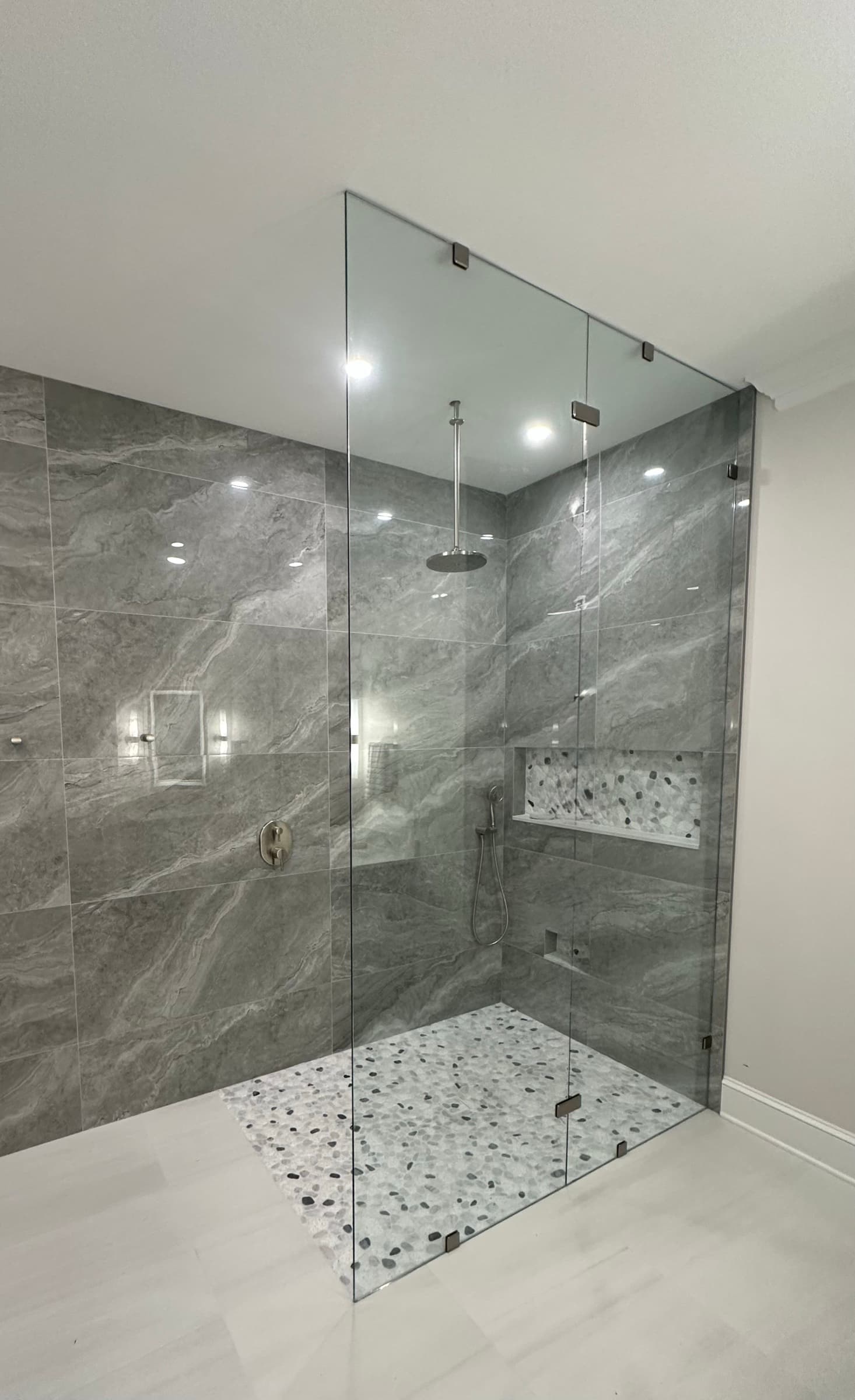 Marble Shower with Pebble Floor